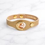 Mare - arany színű bőr karkötő gyönggyel